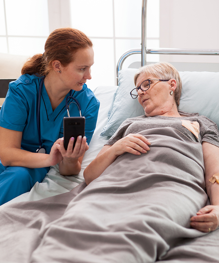 Carewell caregiver providing patient care at home